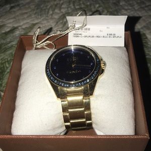 women’s mint condition coach watch with blue face